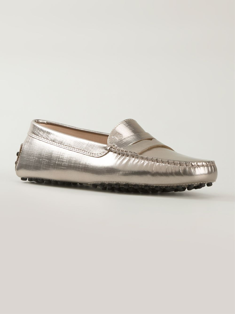 tods gold loafers