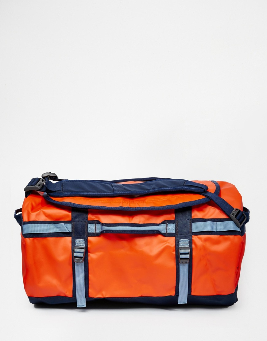red north face duffel bag