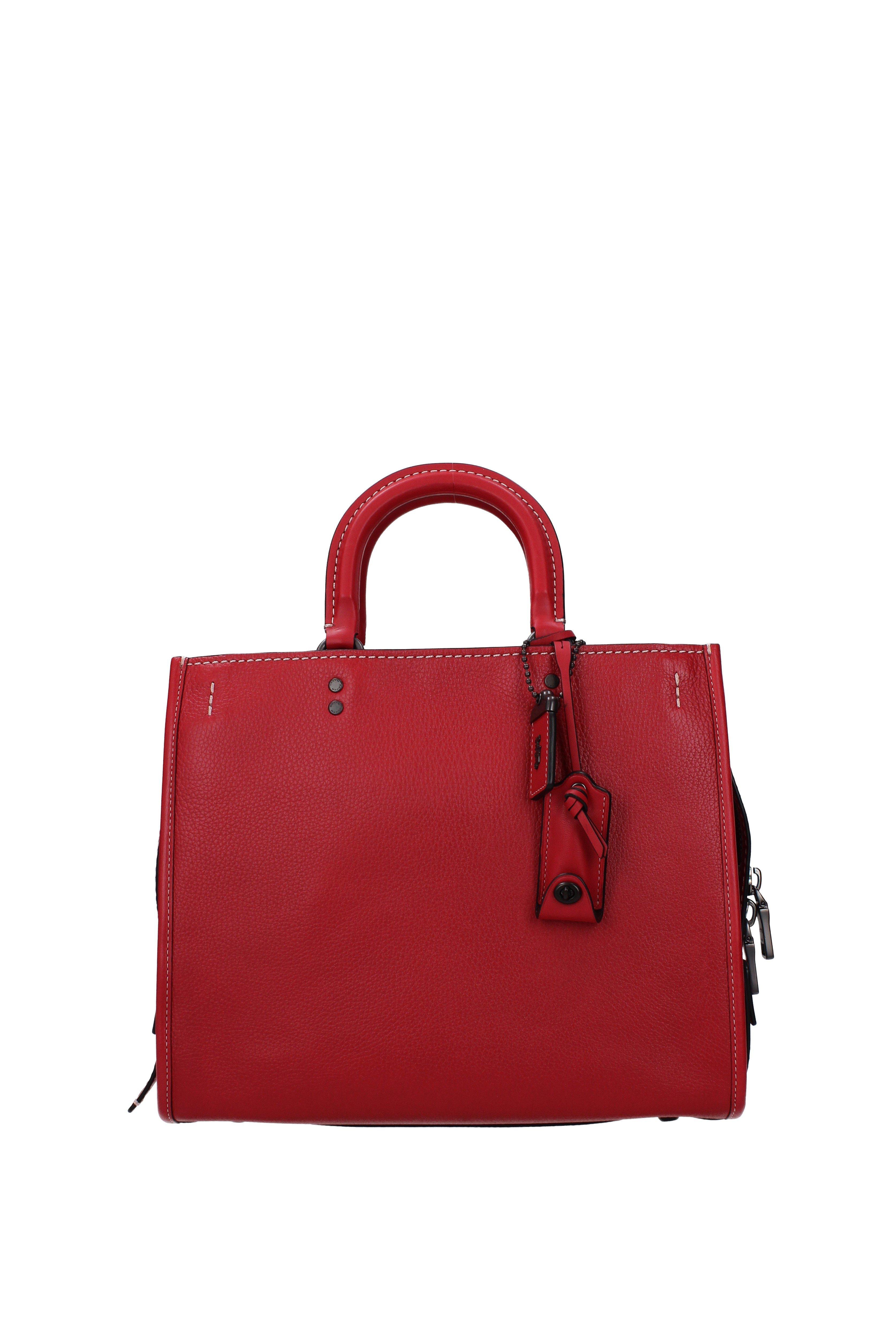 red shiny coach purse