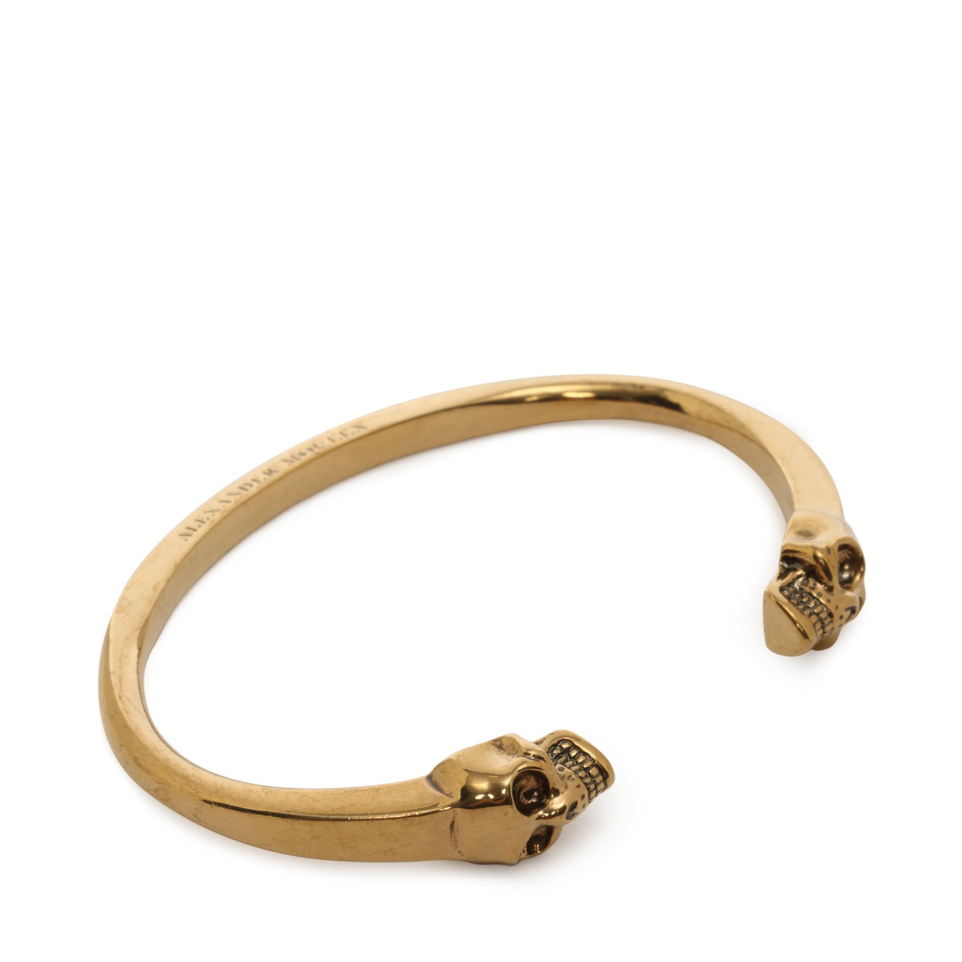 Lyst Alexander Mcqueen Twin Skull Bracelet In Metallic Gallery