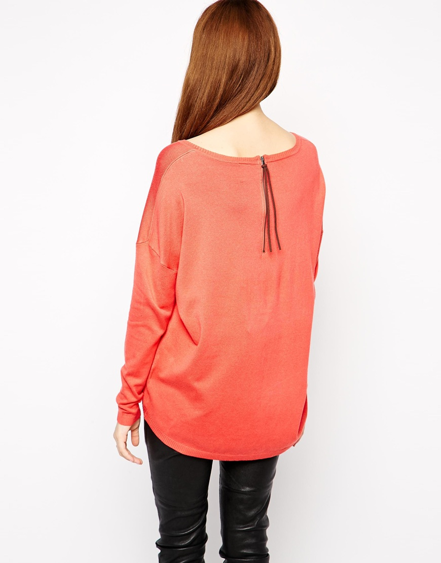 orange asymmetrical top