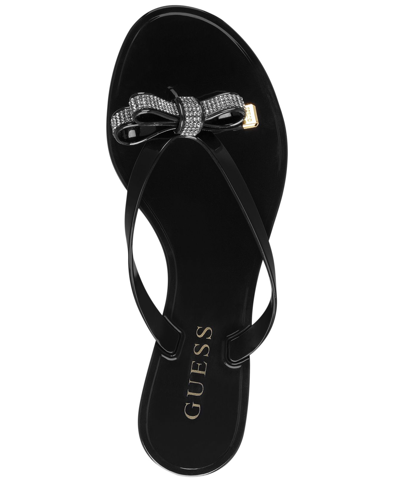 Lyst - Guess Jelsie Bow Jelly Flip Flops in Black