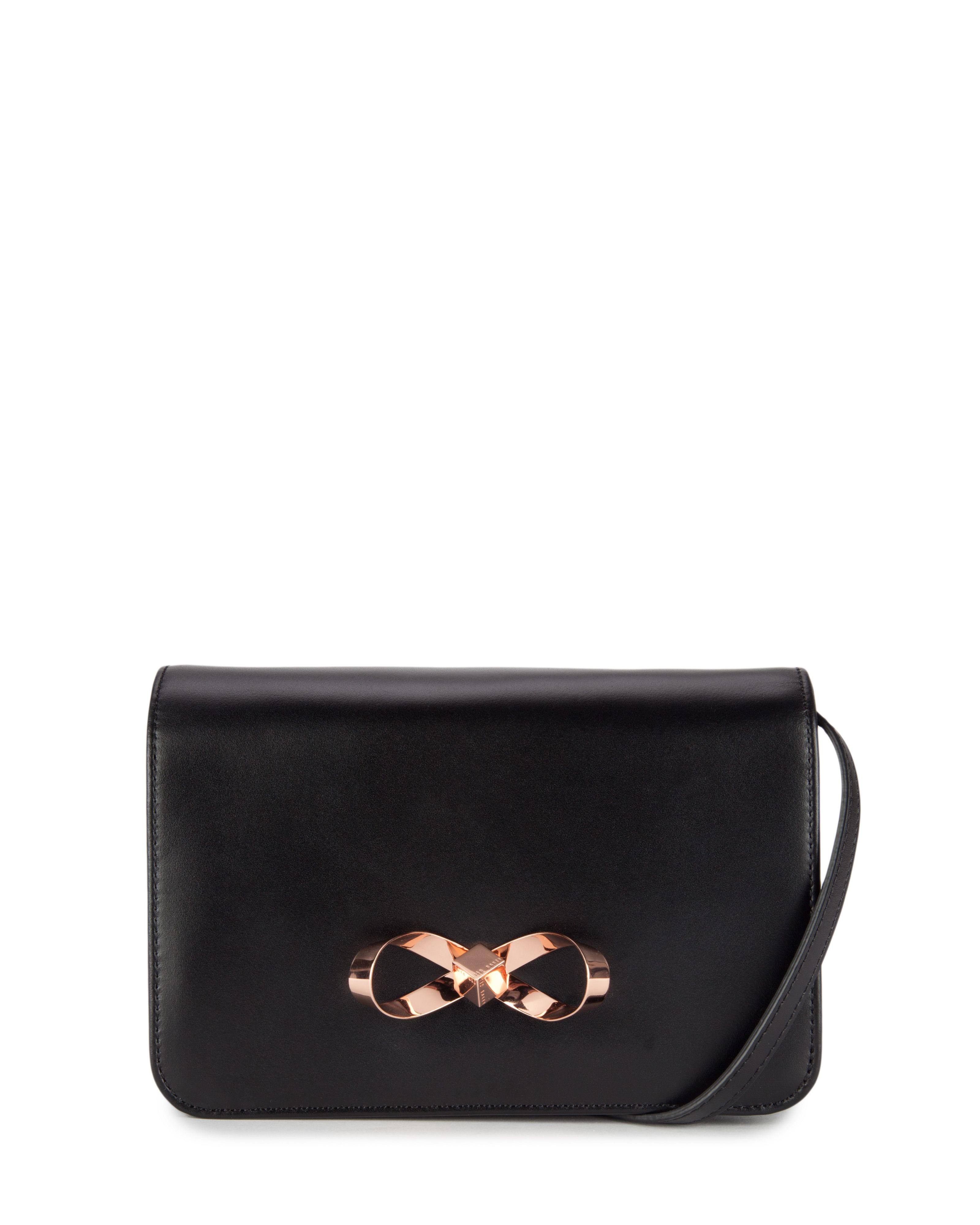 Main navigation COACH Bright Pink Floral Bow Fold Over Leather Clutch Crossbody Bag See more like this. Pink Kate Spade Clutch Purse with Black Leather Trim and Bow - ADORABLE! Pre-Owned. INC International Concepts Leesie Black Rhinestone Bow Clutch Handbag See more like this.