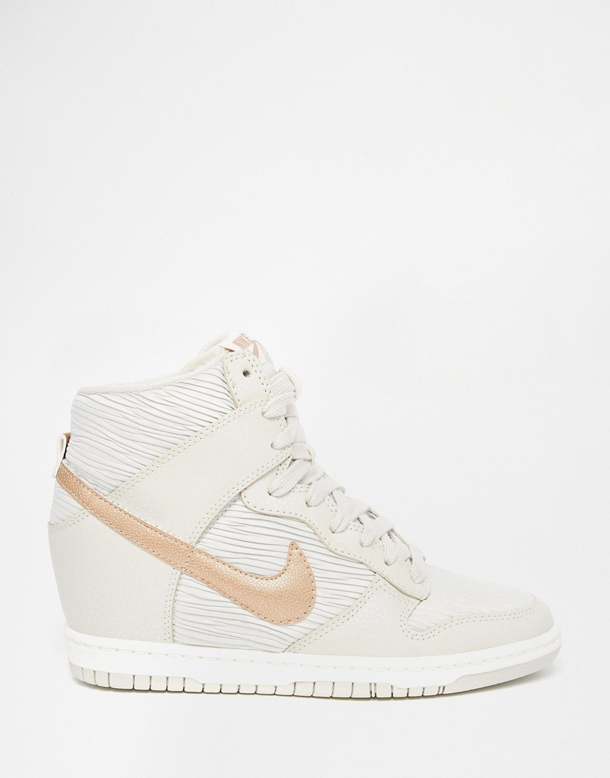white nike with rose gold