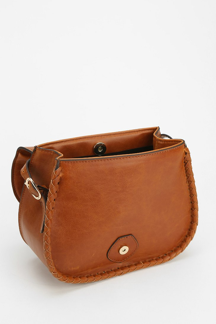 Lyst - Urban Outfitters Whipstitch Crossbody Saddle Bag in Brown