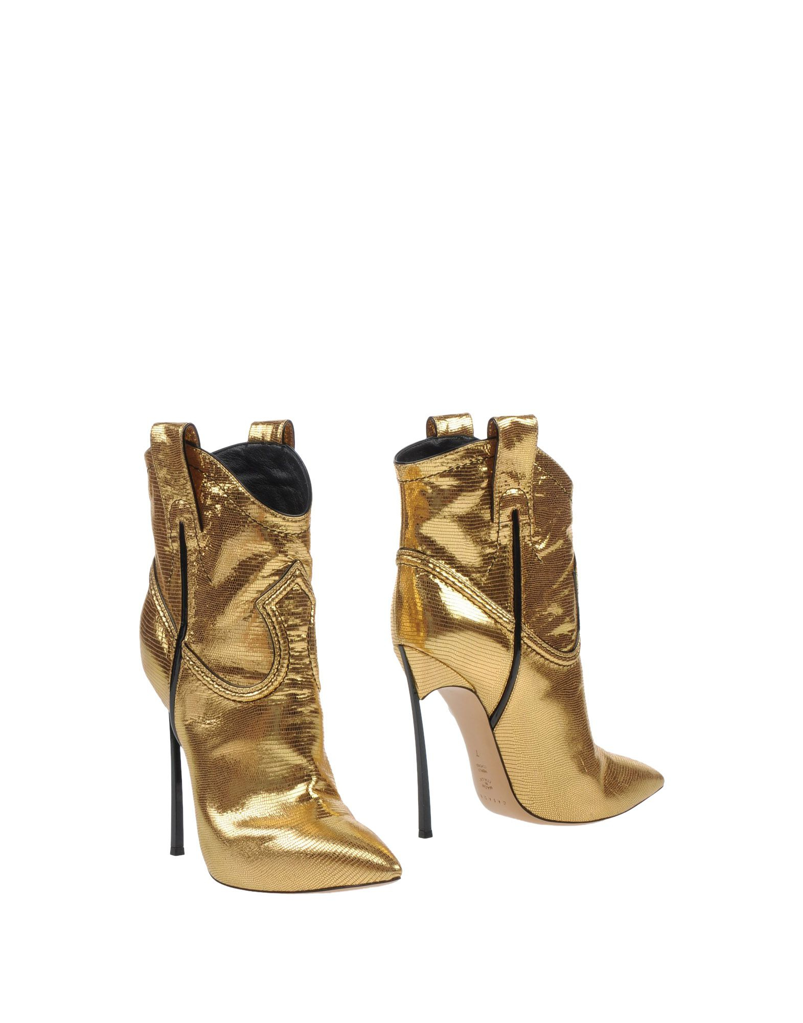 Casadei Ankle Boots in Gold | Lyst