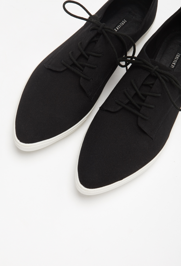 ladies black canvas plimsolls
