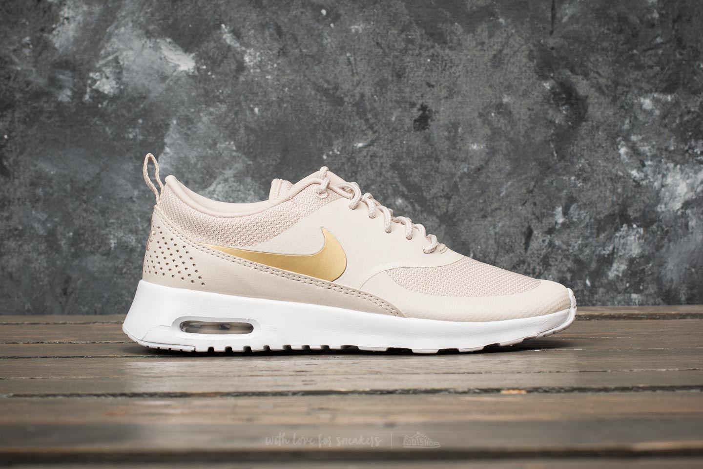 nike air thea gold