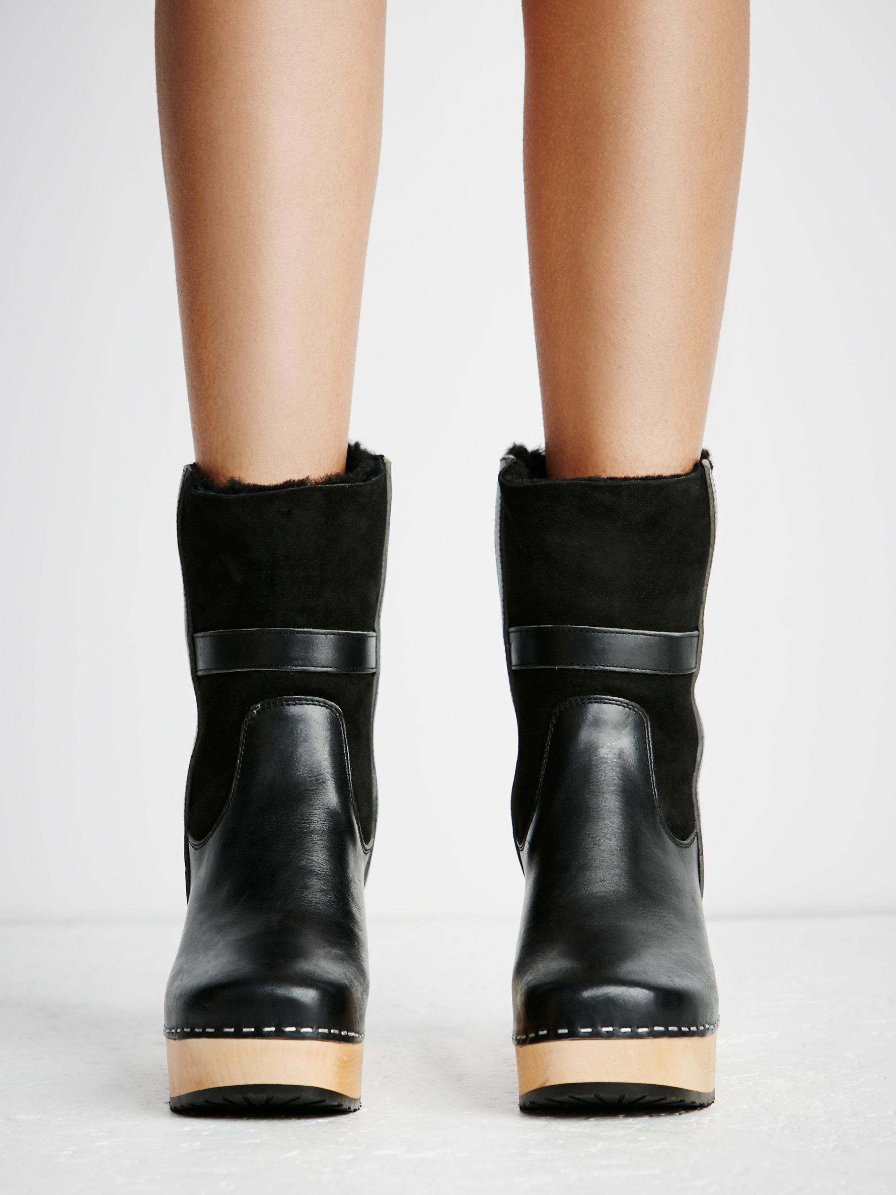 knee high clog boots