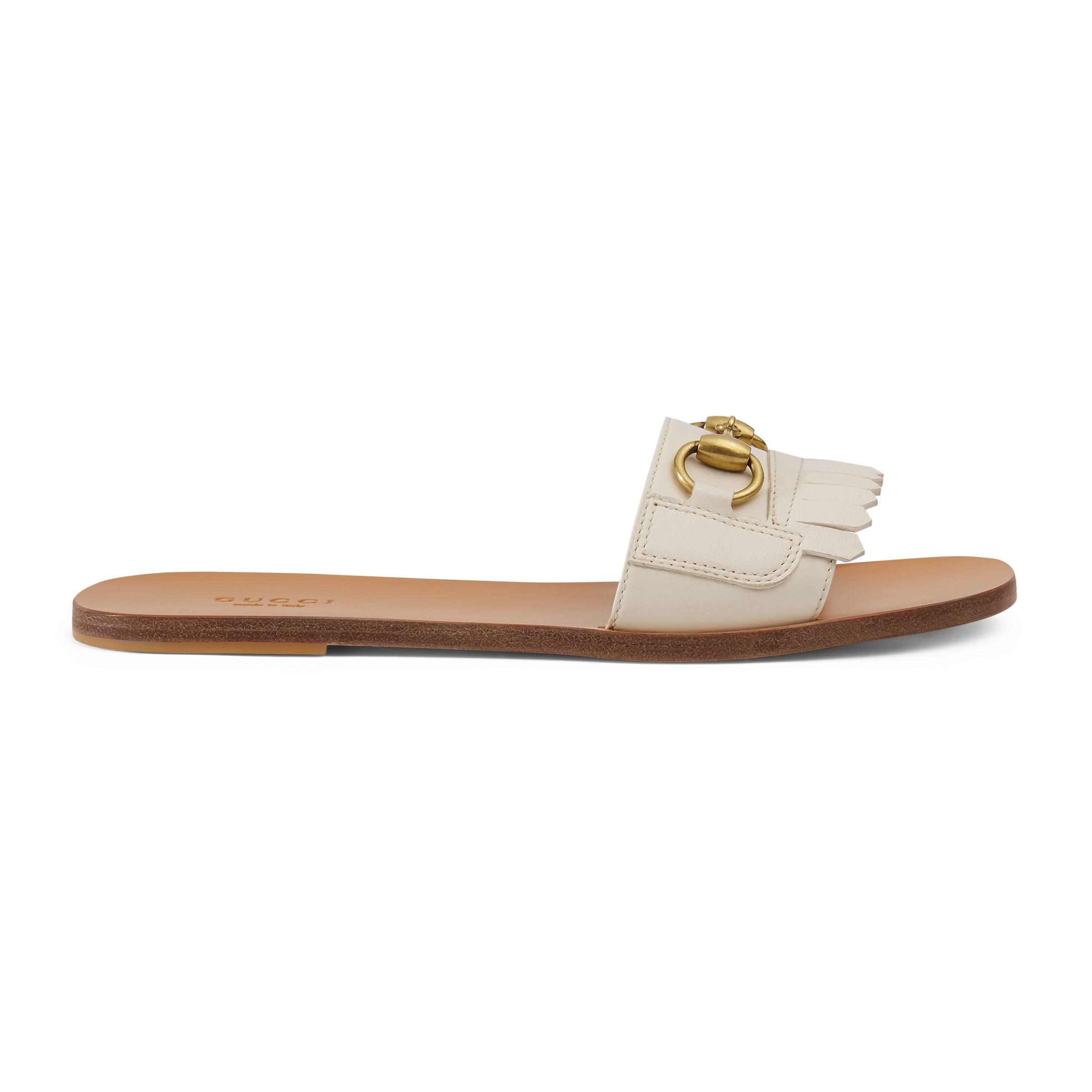 Gucci Fringe Leather Horsebit Slide in White - Lyst