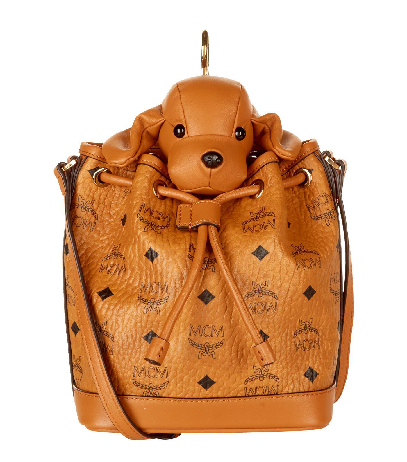 Mcm Heritage Drawstring Dog Cross Body Bag In Brown Lyst View Fullscreen