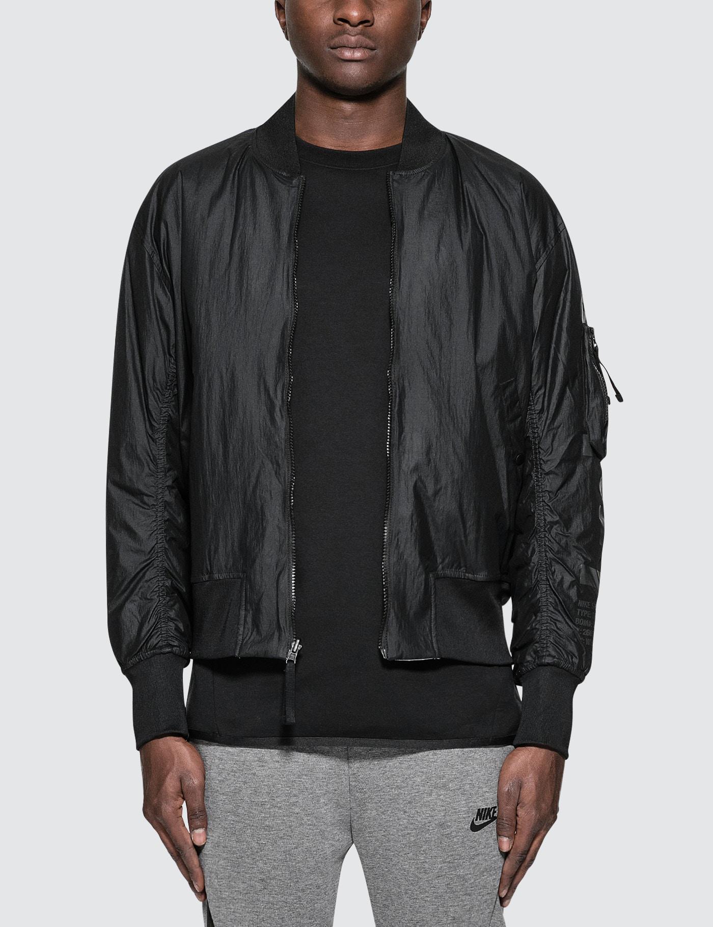 lyst nike nsw af1 rev jacket in black for lyst nike nsw af1 rev jacket in black for