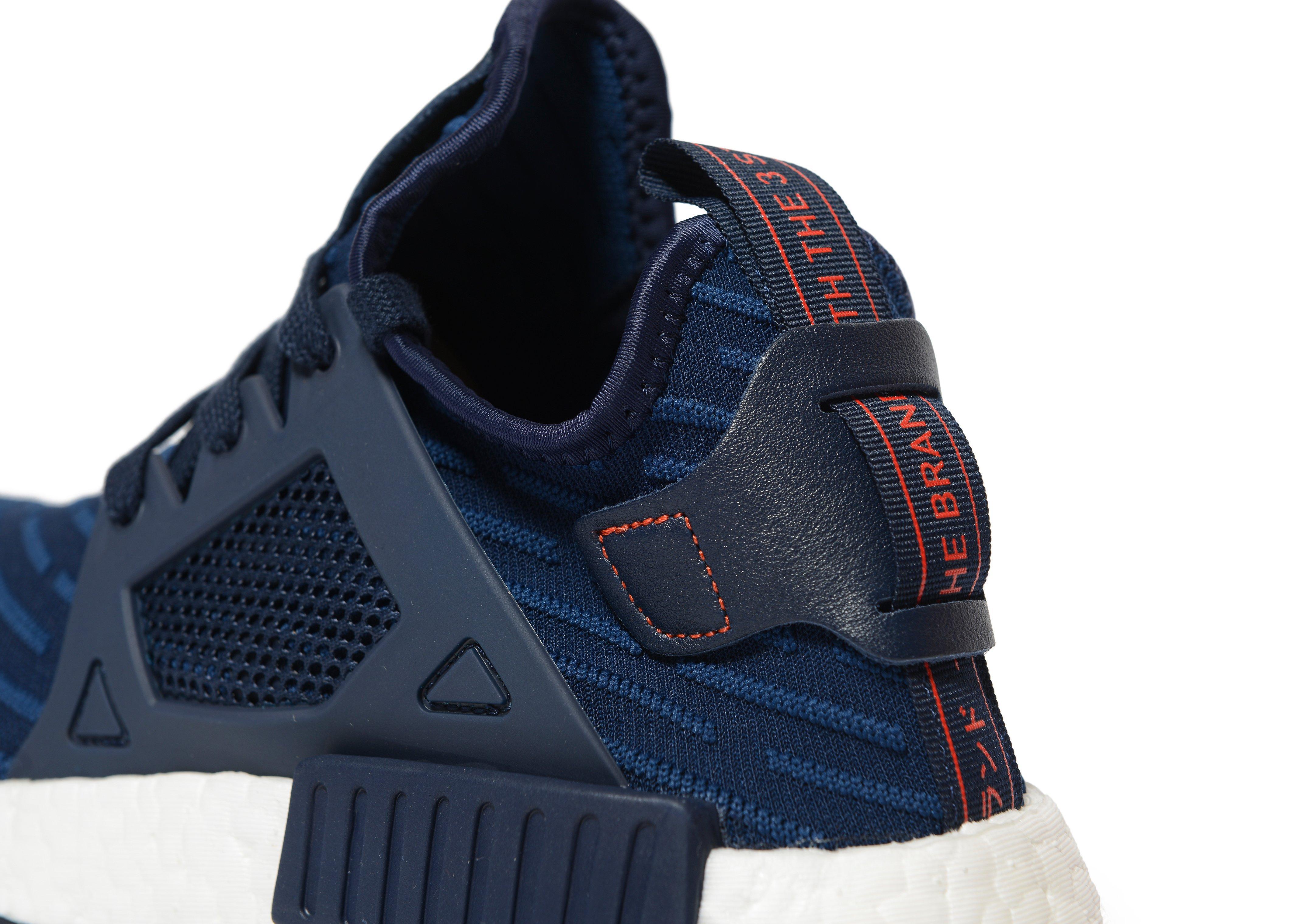 navy blue adidas nmd