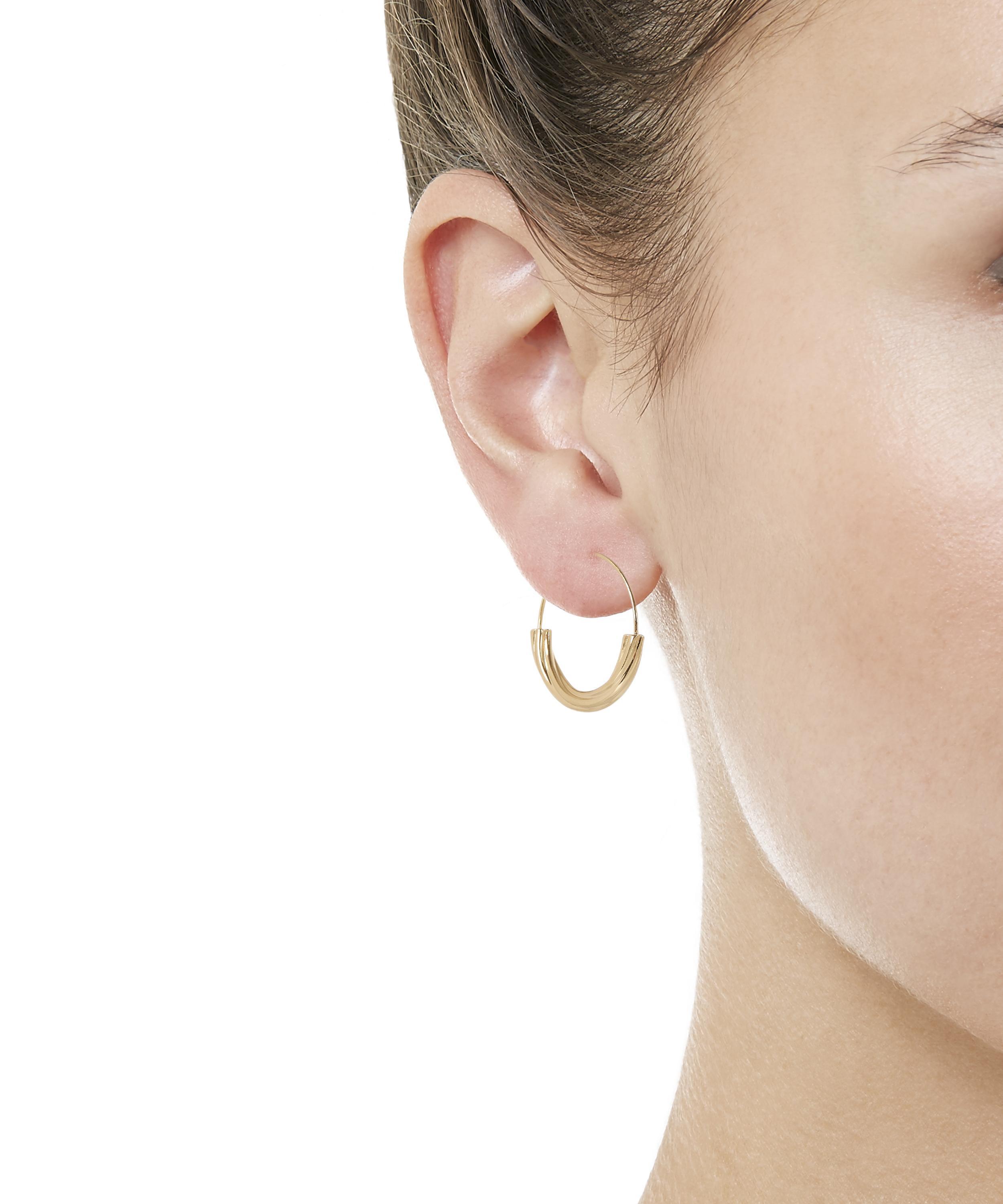 Lyst Maria Black Gold Plated Tove Small Hoop Earring In Metallic
