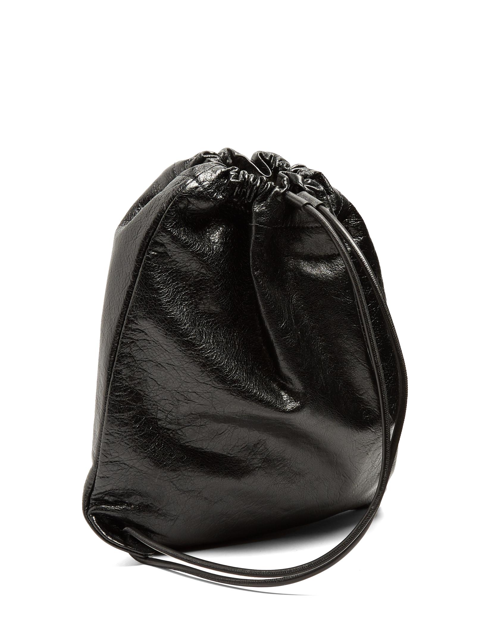 Balenciaga Arena Leather Drawstring Backpack in Black for Men Lyst