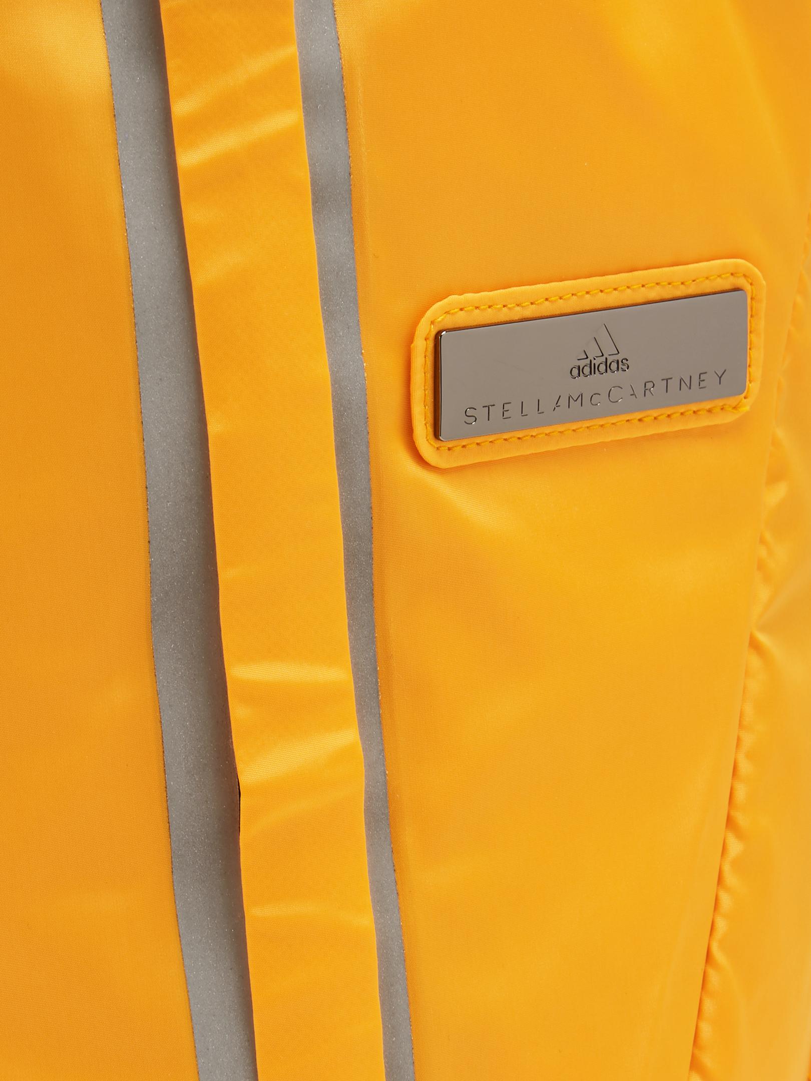 d4omru1fml nerstone adidas by stella mccartney ORANGE Adizero Running Backpack