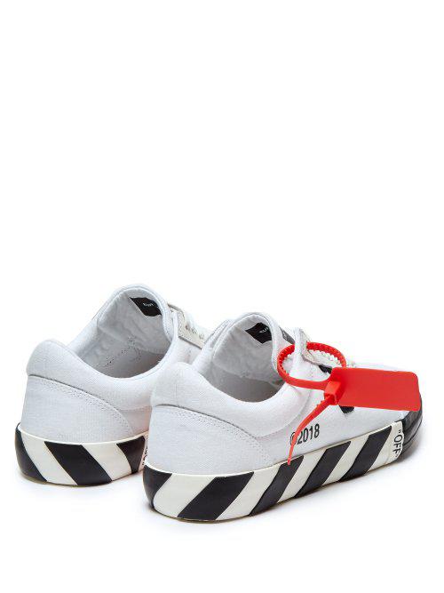 vulc canvas trainers off white