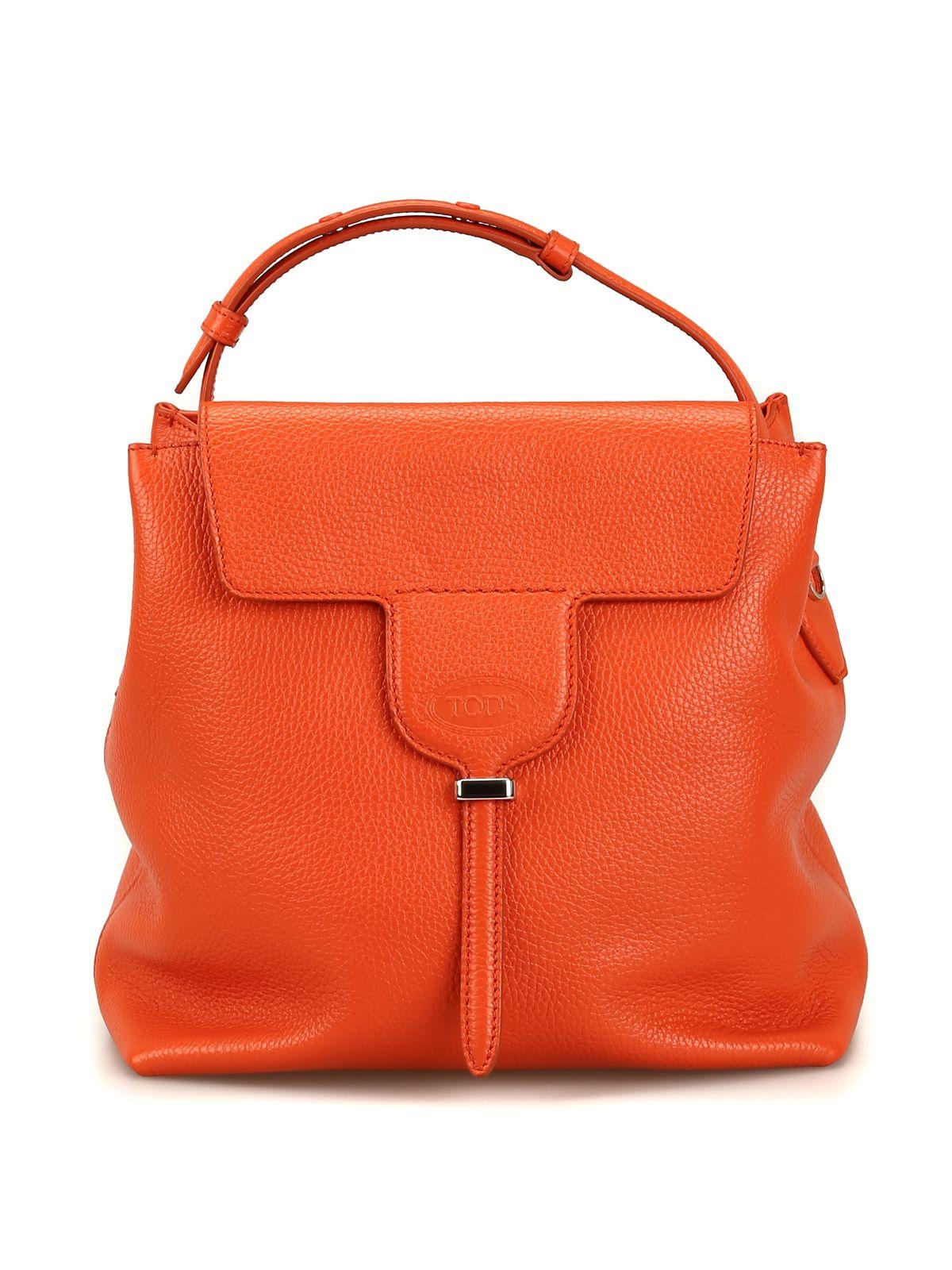 orange leather handbags and purses