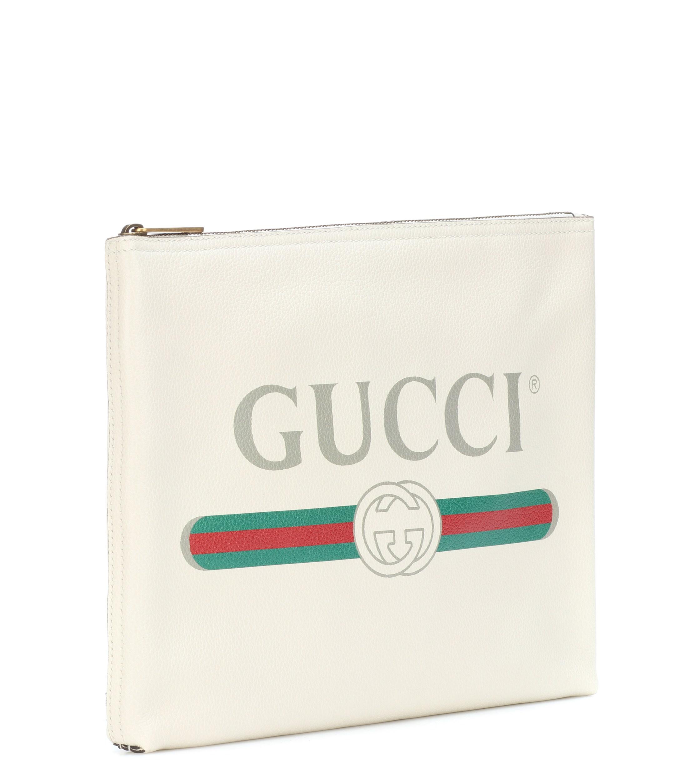 Gucci Printed Leather Clutch in White - Save 47% - Lyst