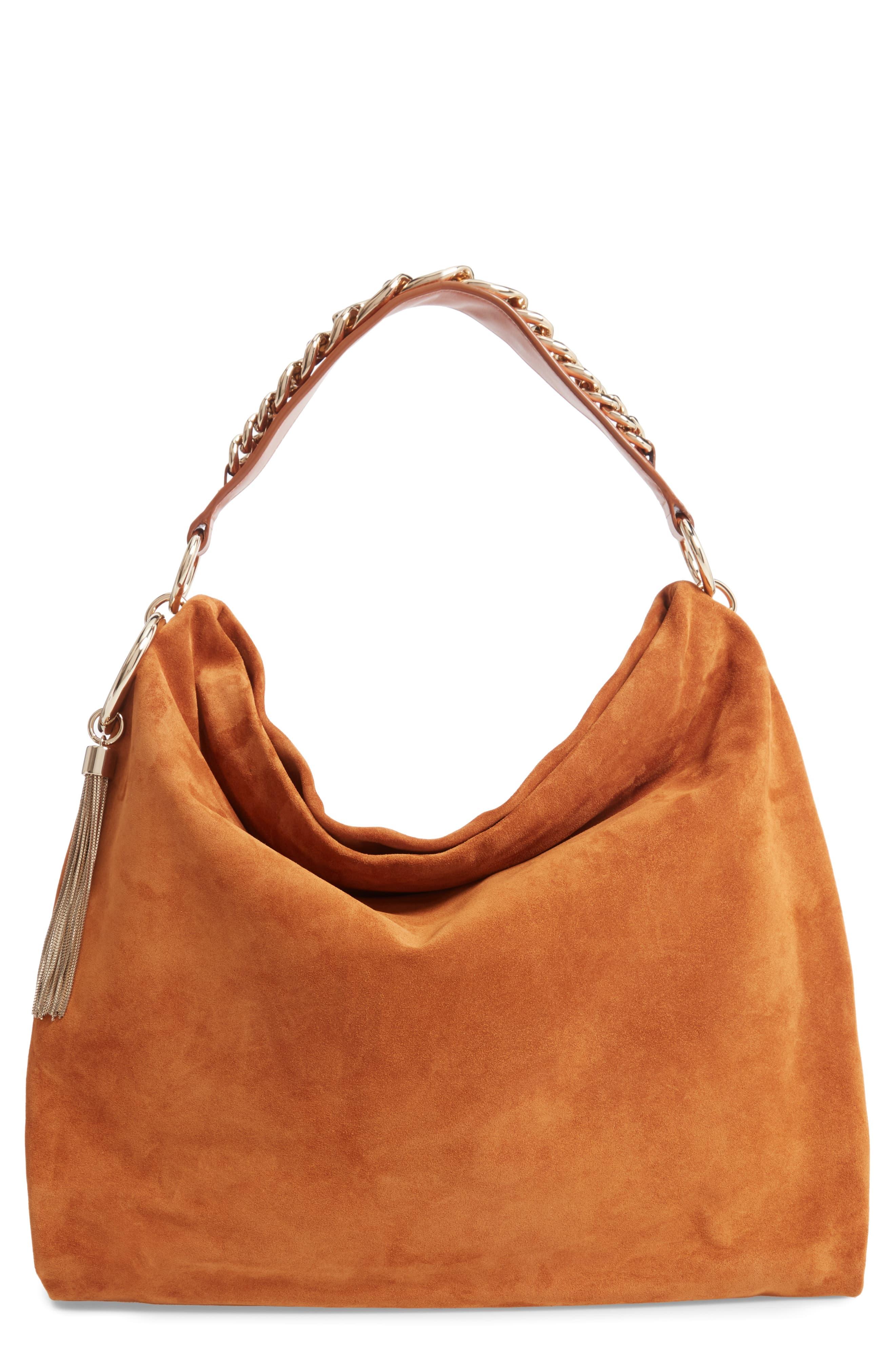 orange leather purse coach