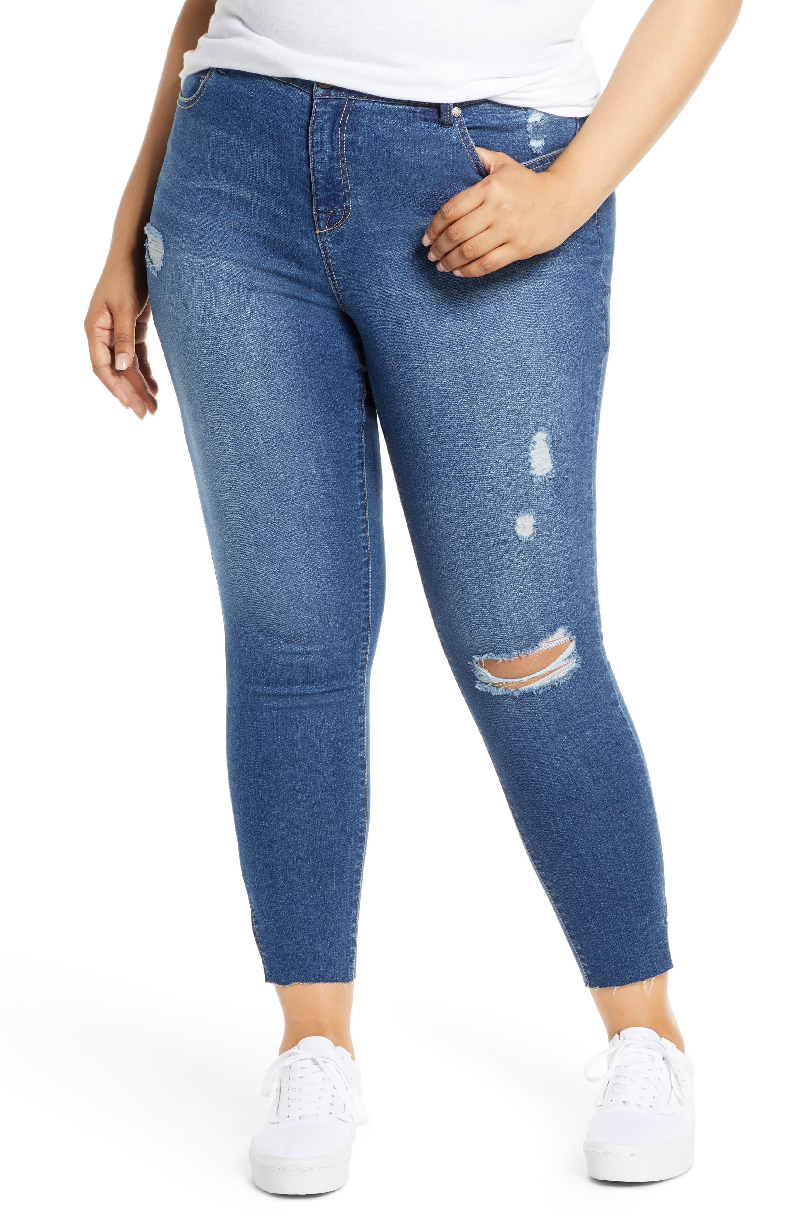 split hem blue jeans