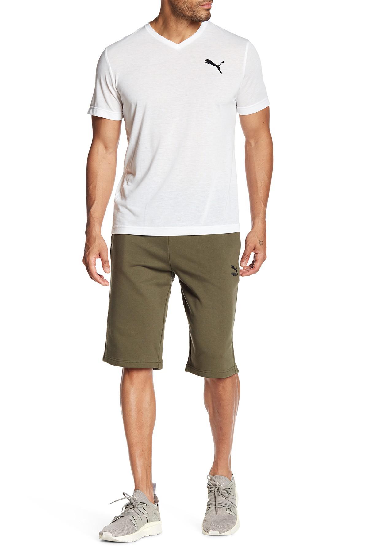 PUMA Logo Bermuda Shorts in Green for Men - Lyst