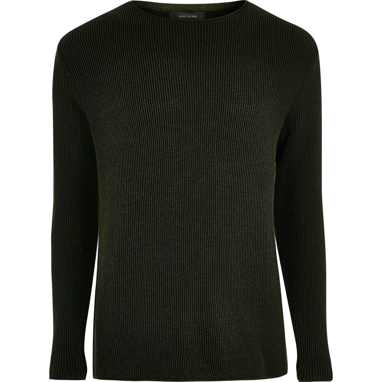 Khaki Green Jumper This jumper is made from a merino wool mix with slight stretch and a contrast coloured inside. An A-line fit, it has a wide neckline, ¾ sleeves and minimal finishes.