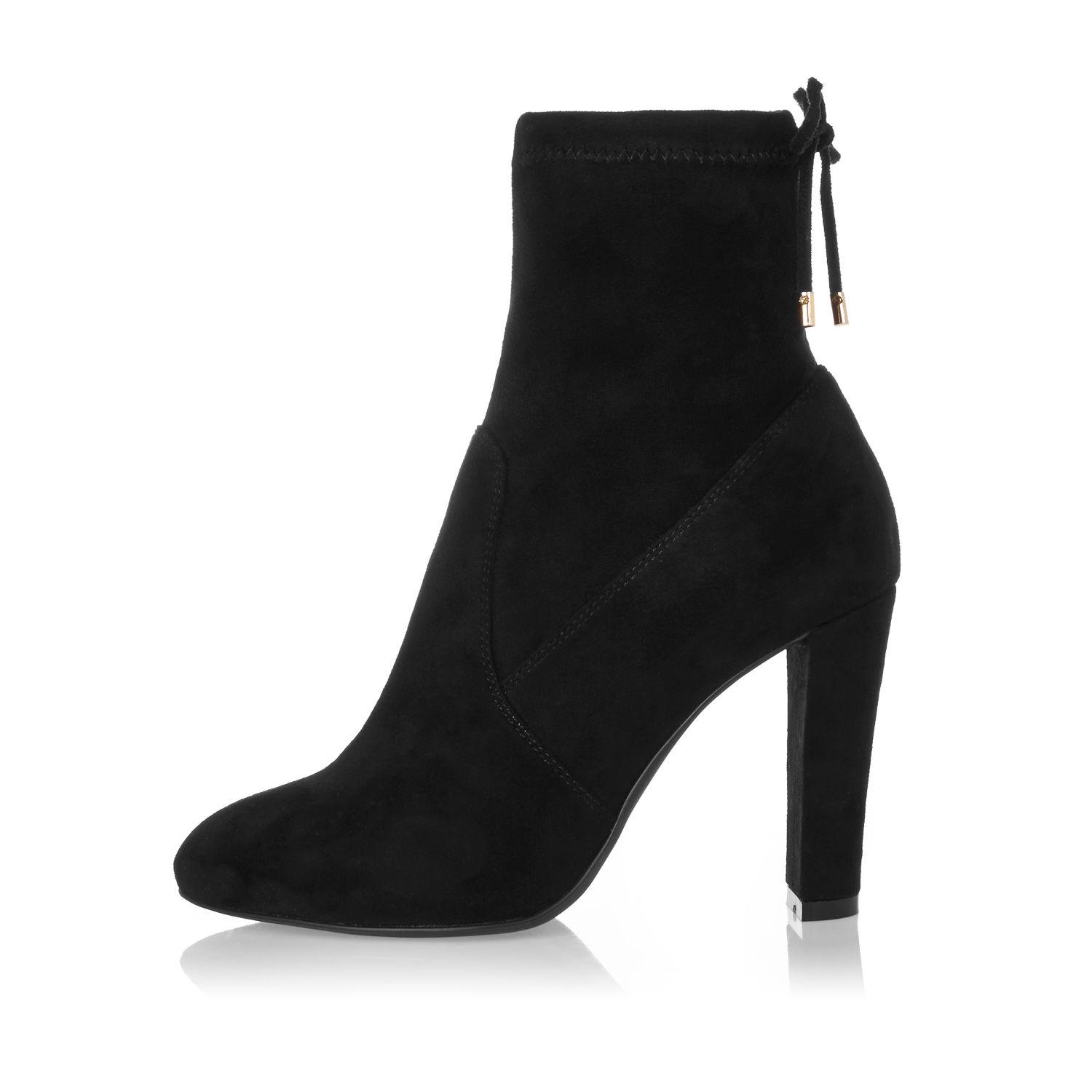 black high heeled sock boots