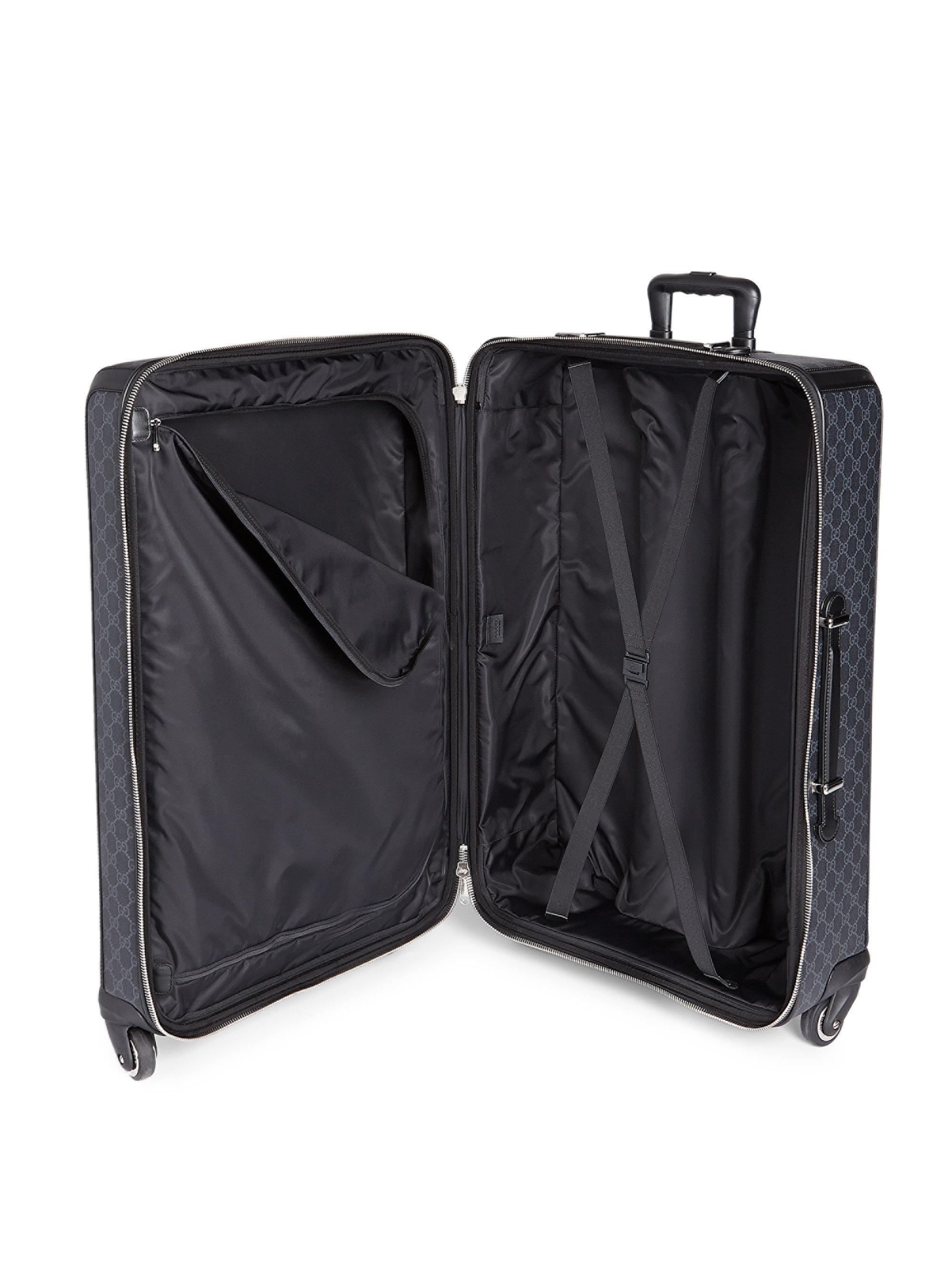 gucci - black gg supreme large suitcase for men - lyst