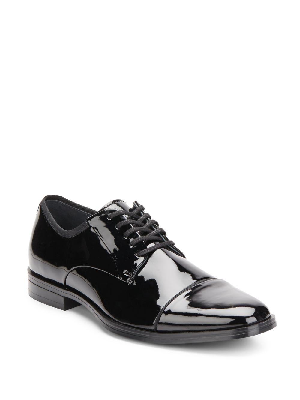 Lyst - Calvin Klein Klinton Faux Patent Leather Cap Toe Derby Shoes in ...
