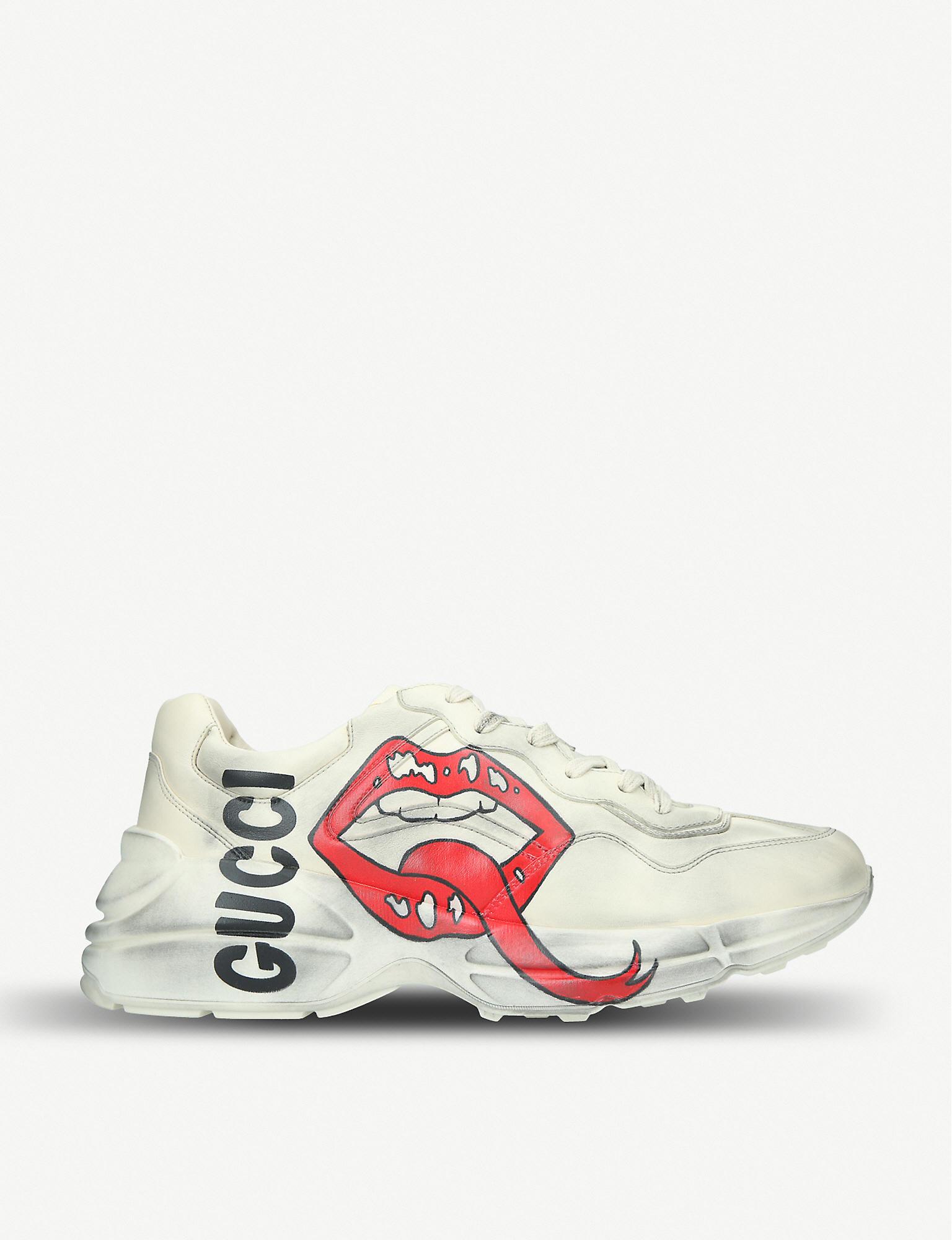 white rhyton gucci logo trainers