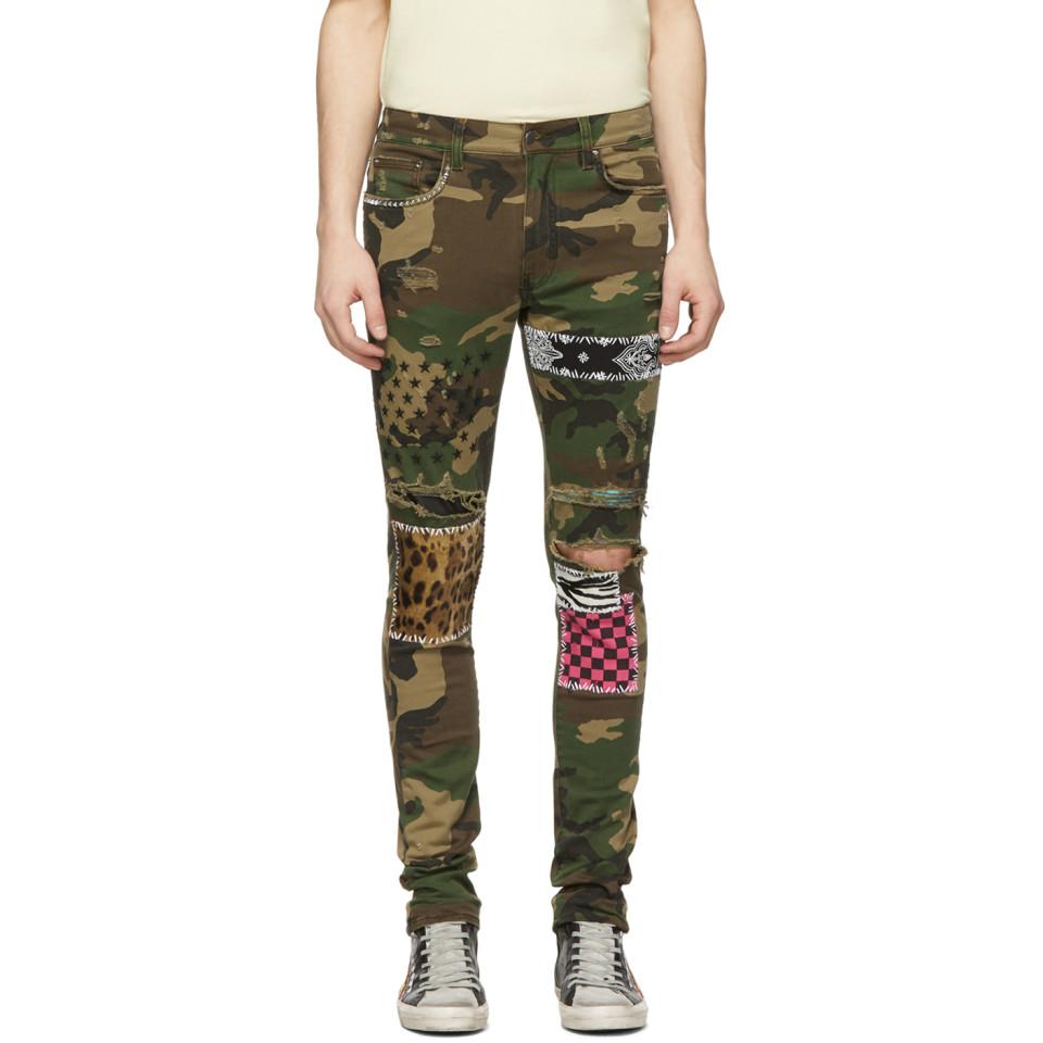 amiri black patch jeans