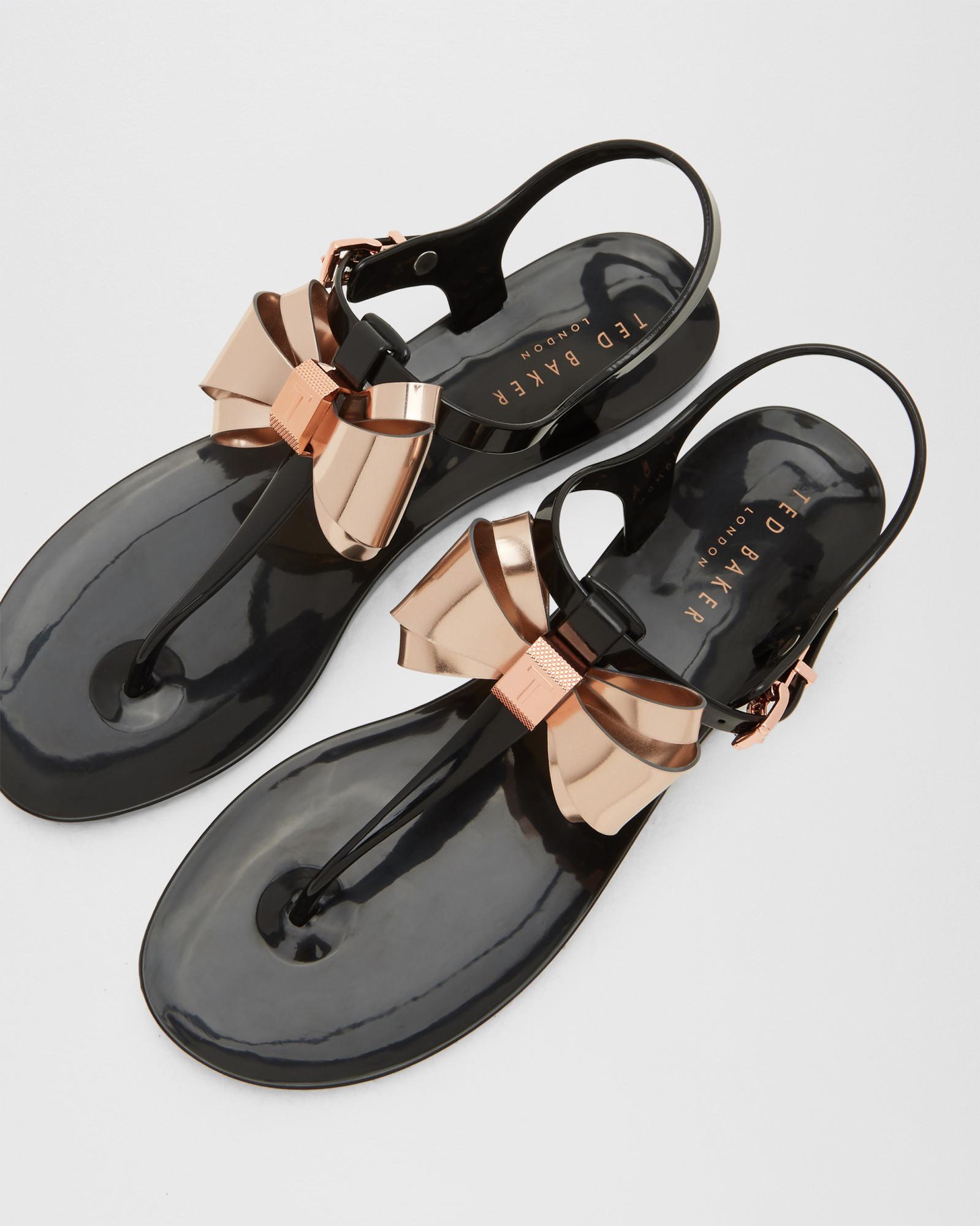 Lyst - Ted Baker Metallic Bow Jelly Sandals in Black