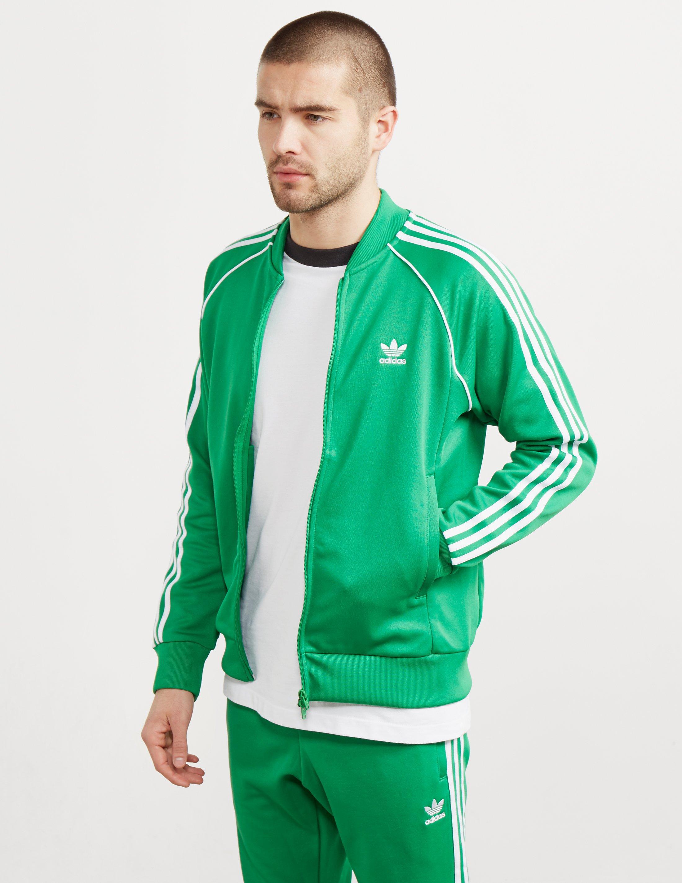 green and white adidas sweatsuit
