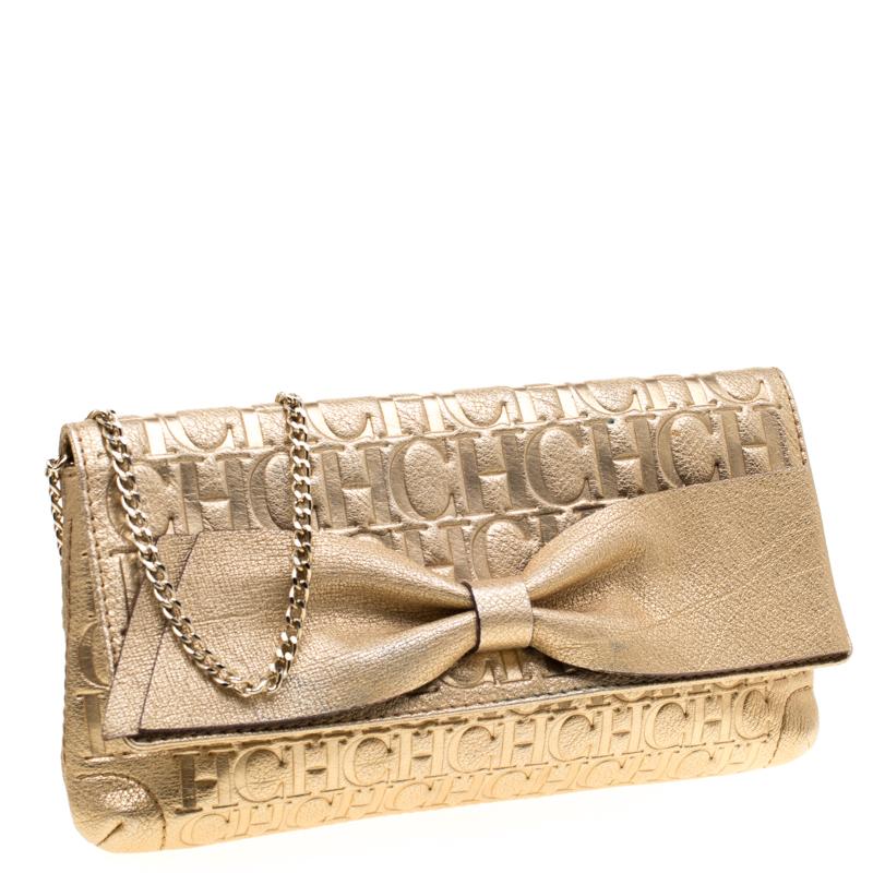 Carolina Herrera Gold Monogram Leather Bow Bag in Metallic - Lyst