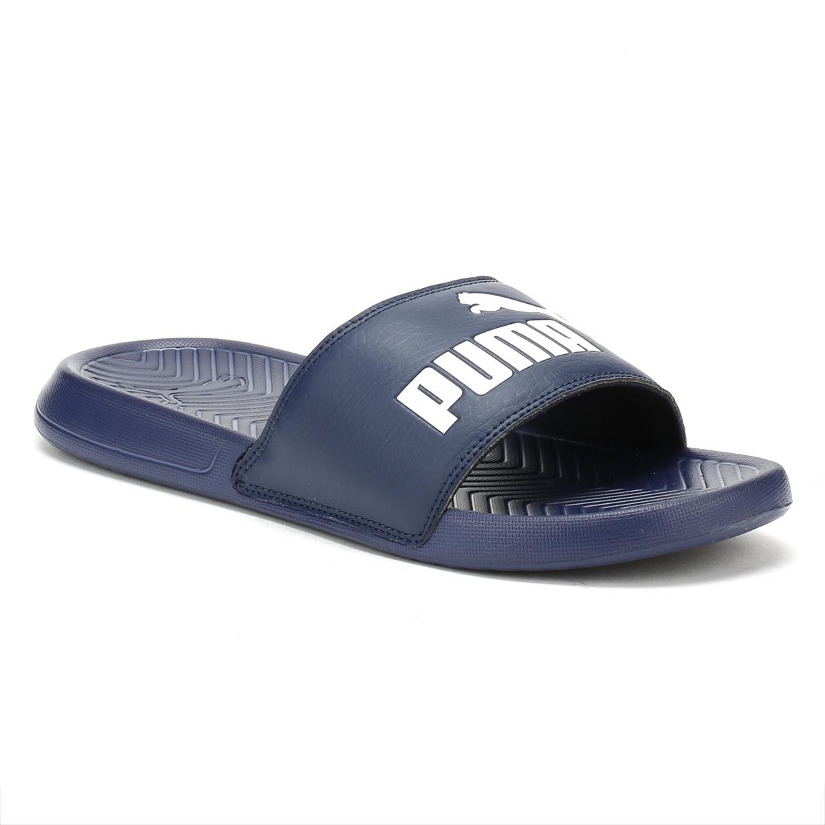 navy blue puma slides