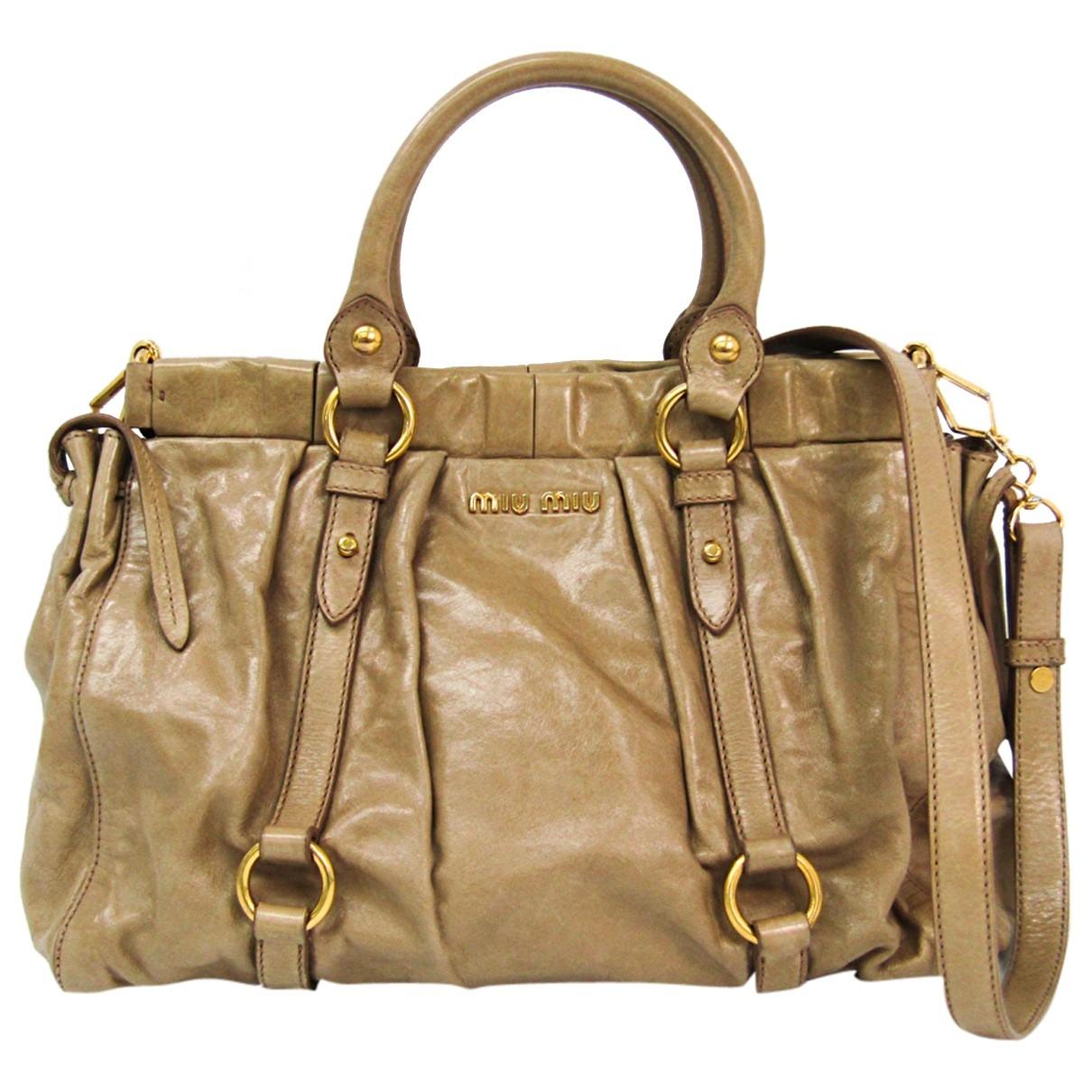 Miu Miu Pre-owned Vitello Brown Leather Handbags in Brown - Lyst