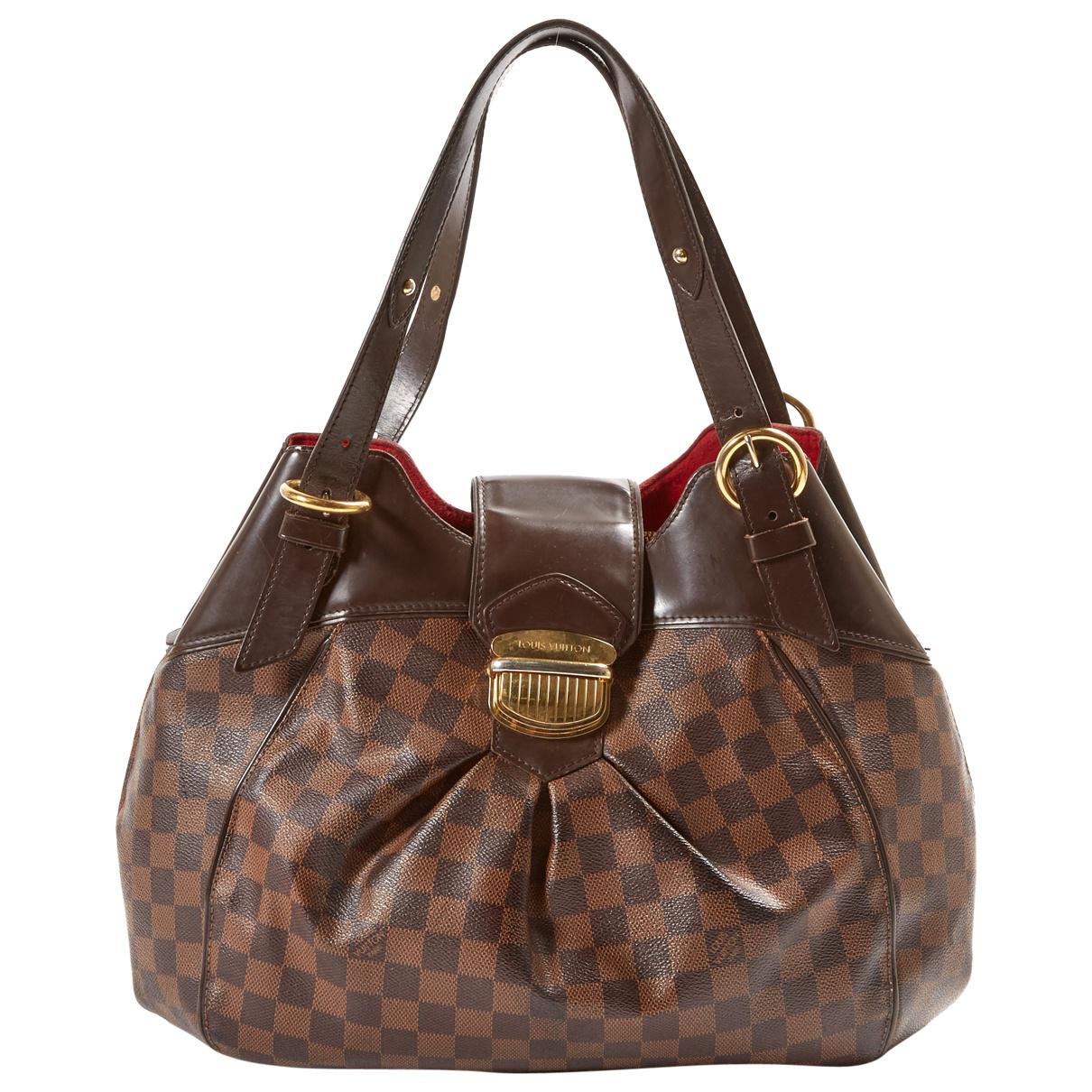 Lyst - Louis Vuitton Pre-owned Brown Leather Handbags in Brown