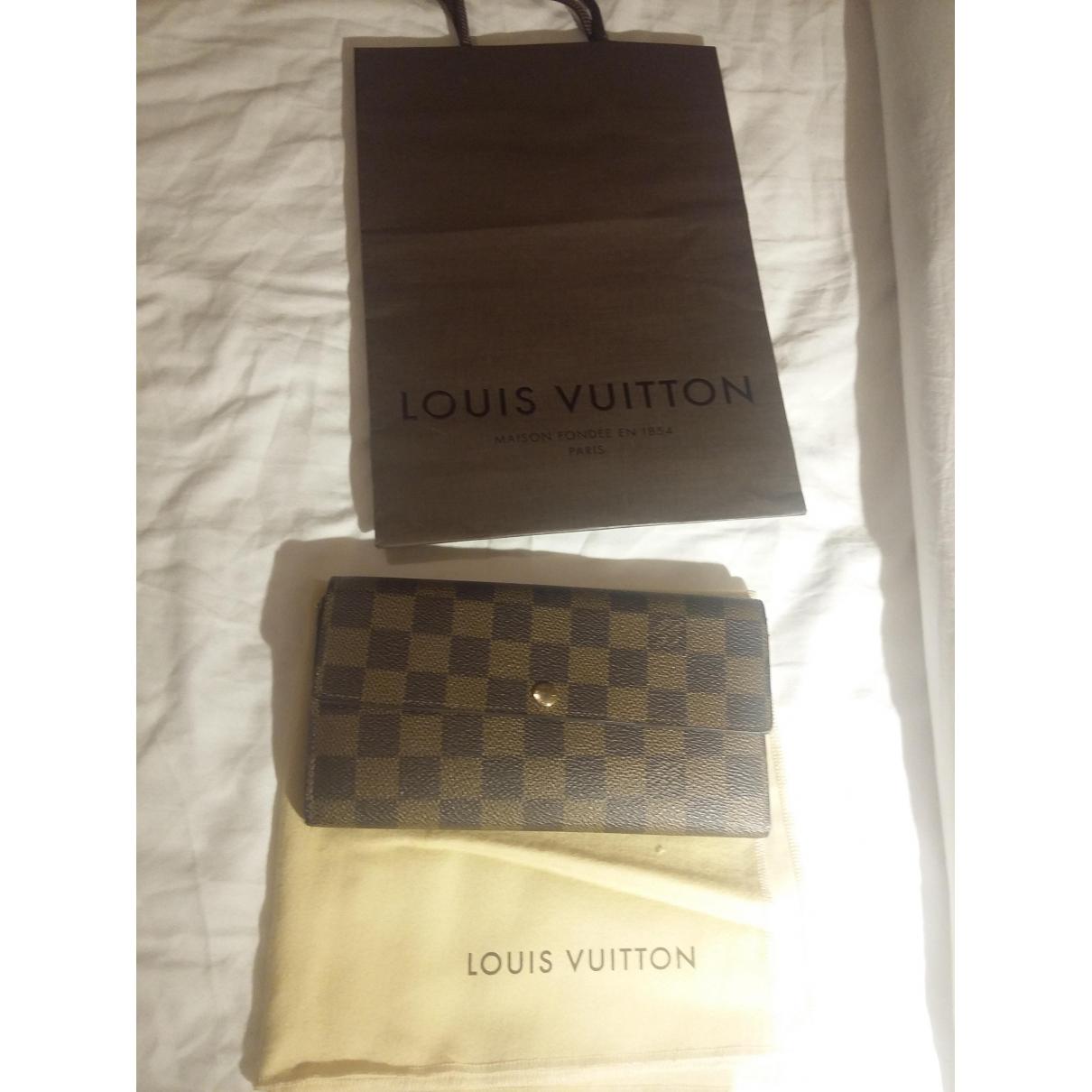 Lyst - Louis Vuitton Cloth Wallet in Brown
