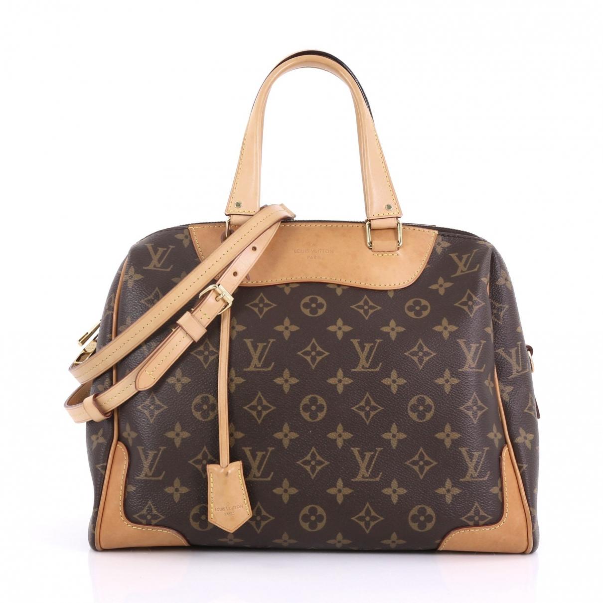 Louis Vuitton Retiro Pm Brown Cloth Handbag in Brown - Lyst