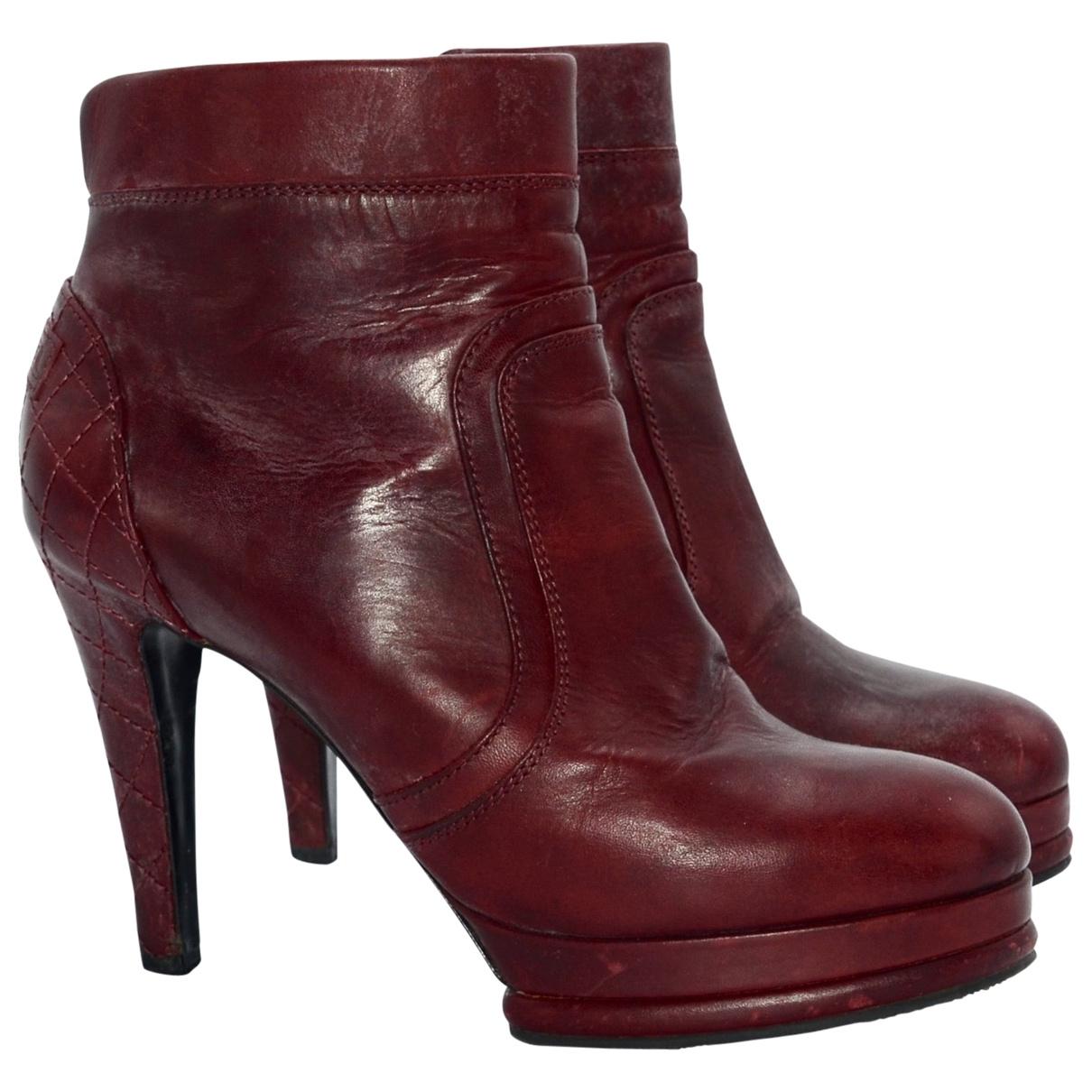 Lyst Chanel Leather Ankle Boots in Purple