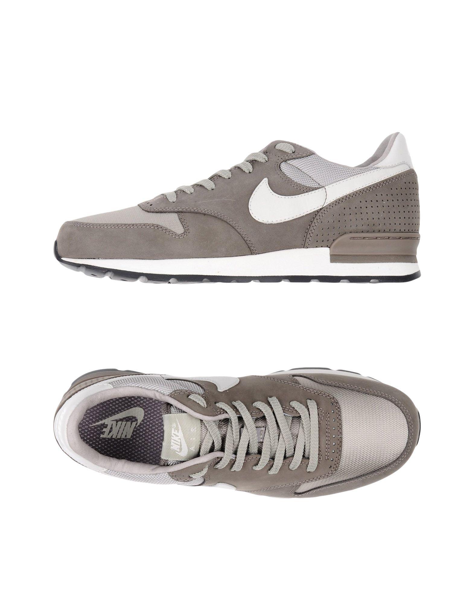 grey low top nikes