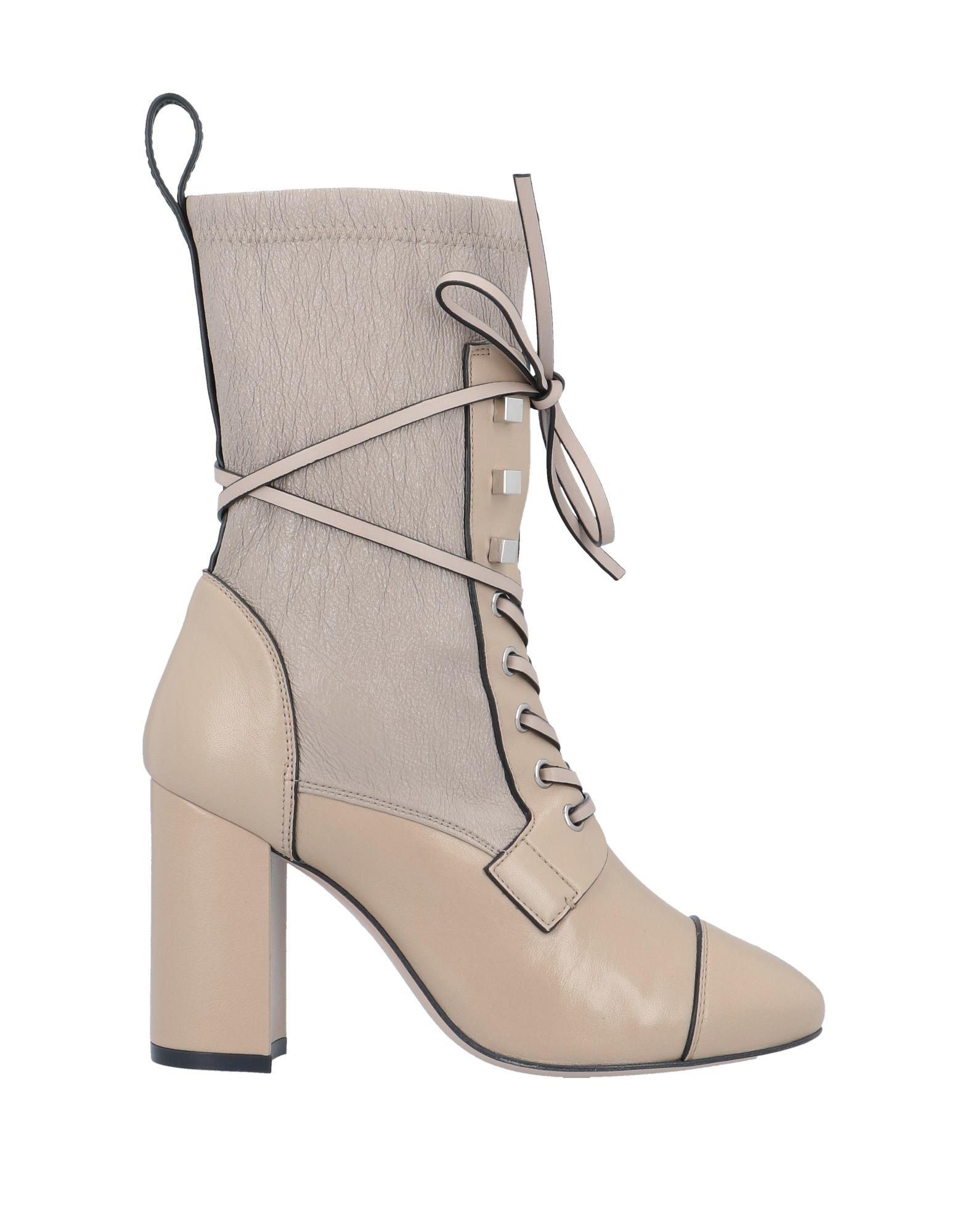 beige stuart weitzman boots