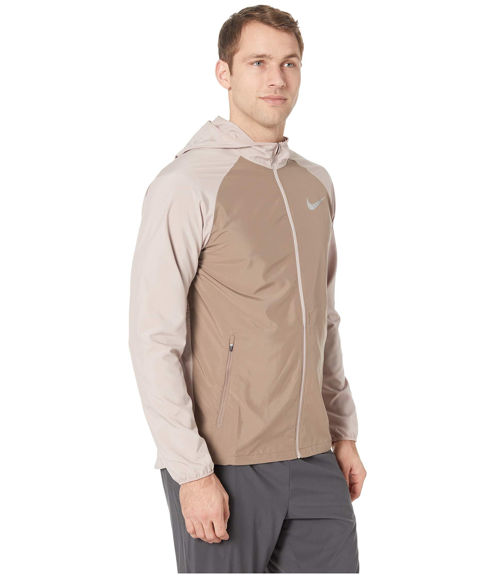 Lyst - Nike Essential Hooded Running Jacket (black) Men's Coat in Brown ...