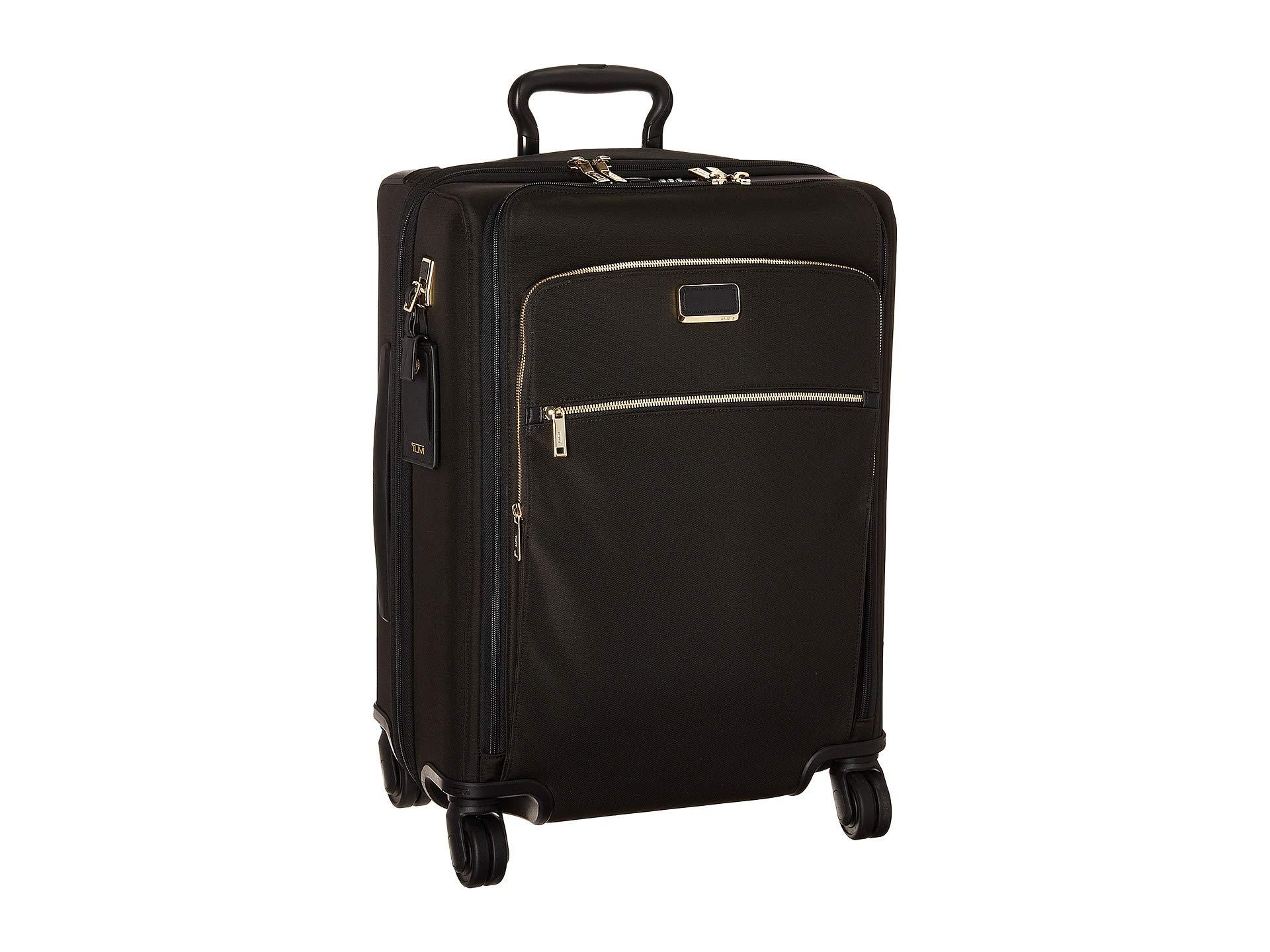 tumi gold luggage